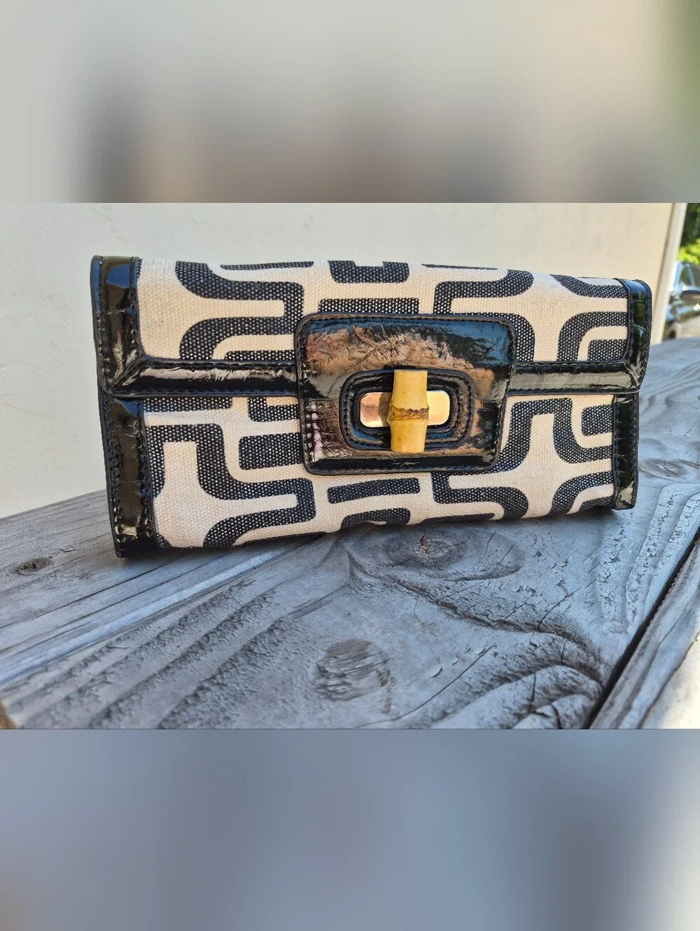 Sondra Roberts Black and Cream Geometric Canvas Clutch with Bamboo Accent